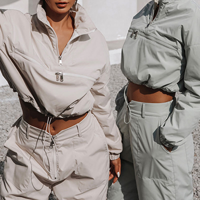 comprar Traje femenino de polero con tirante con etiquetas personalizadas y chaqueta de rompevientos online manufacture