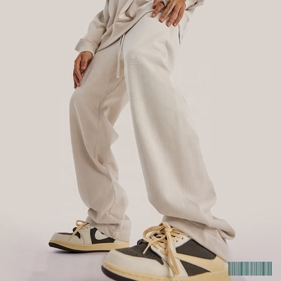 Pantalones de carreras para hombres con tela transpirable y ajuste de piernas anchas