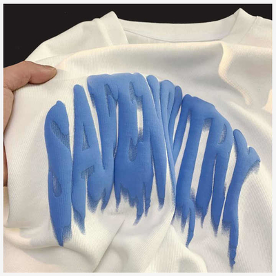 Logotipo personalizado Impresión gráfica 3D de espuma de pulpa camiseta en algodón Supima para ropa callejera masculina