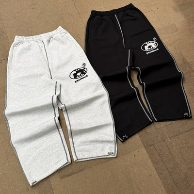 Pantalones de sudor de patas anchas de estilo francés de 500 Gsm con bordado ajustable con cordón de tira, manguito de bolsa, pantalones de pista para hombres